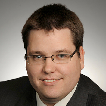 Professional headshot of Alexandre M. Richard, CFA